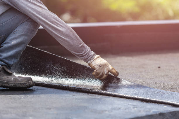 Professional Basement Waterproofing technician working in Richmond, MI